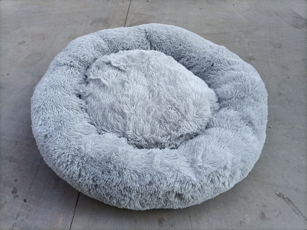 Create a Cozy Haven for Your Furry Friend with the Thick Plush Round Pet Kennel